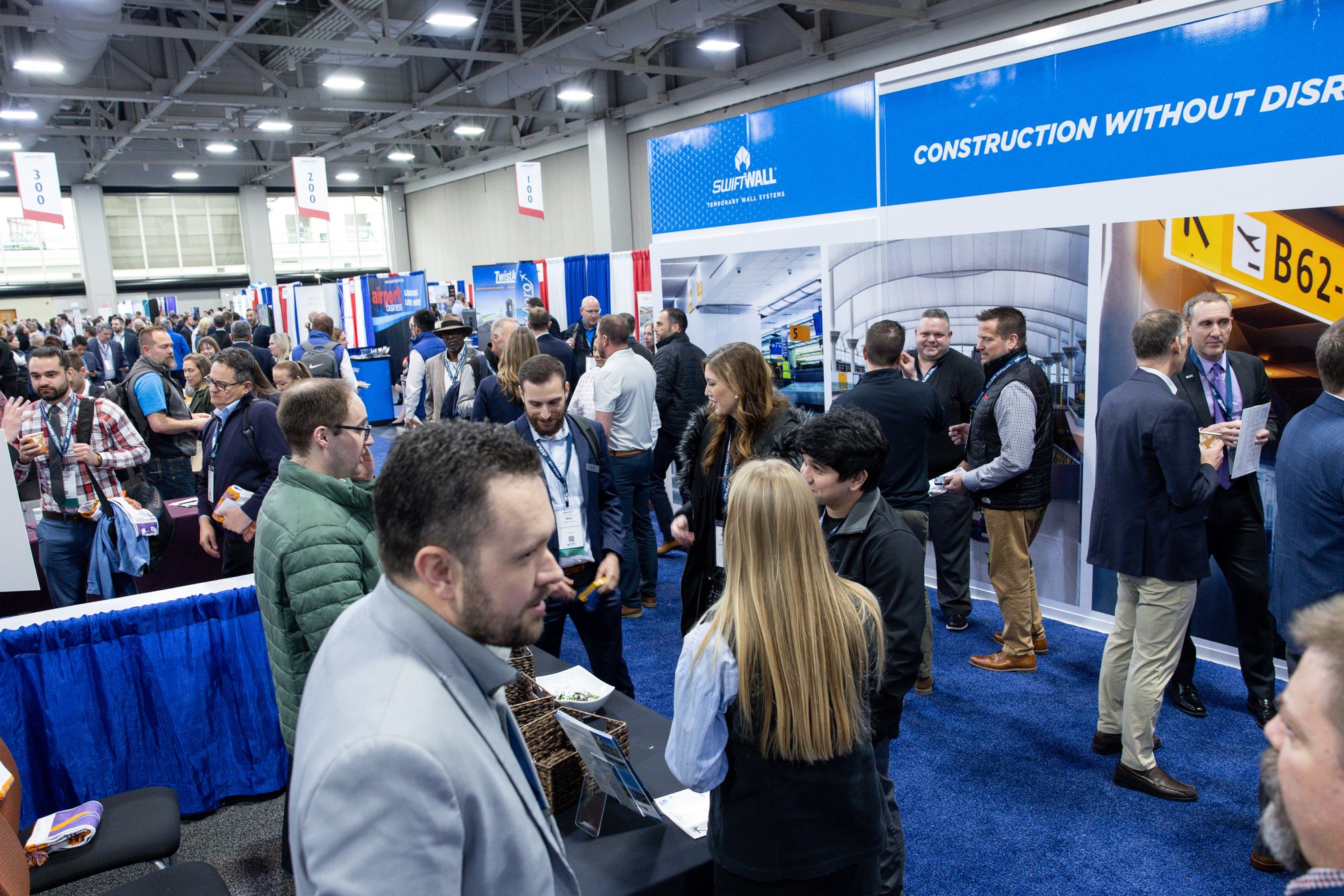 Overhead view of the exhibit hall at the 2024 AAAE/ACC Airport Planning, Design, & Construction Symposium in Salt Lake City.