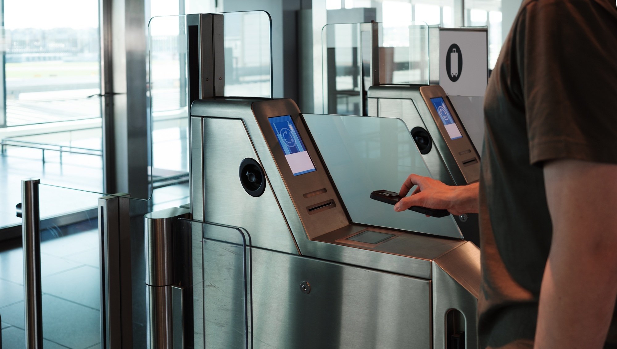 Person scanning boarding pass on phone